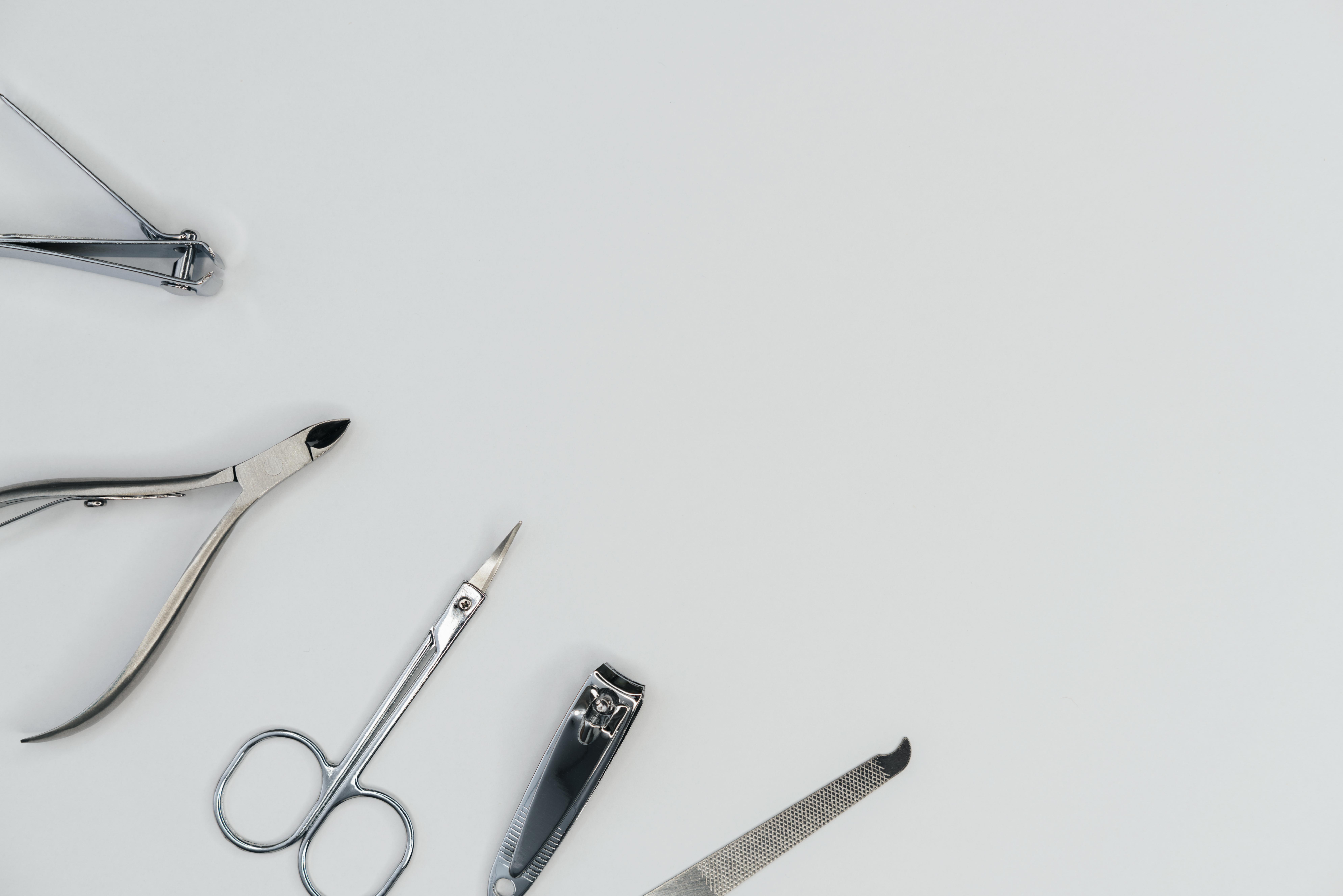 nail-care-accessory-tools-top-view-copy-space